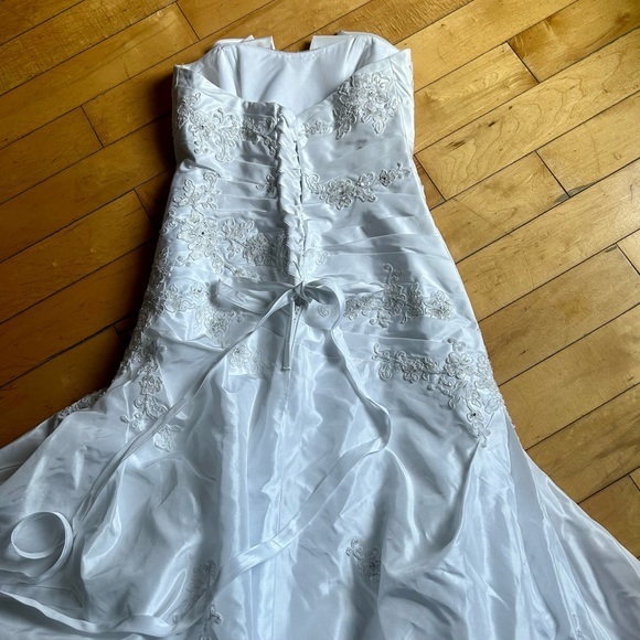 David’s Bridal taffeta side-drape gown with beaded lace
STYLE# WG3011 - Picture 9 of 11